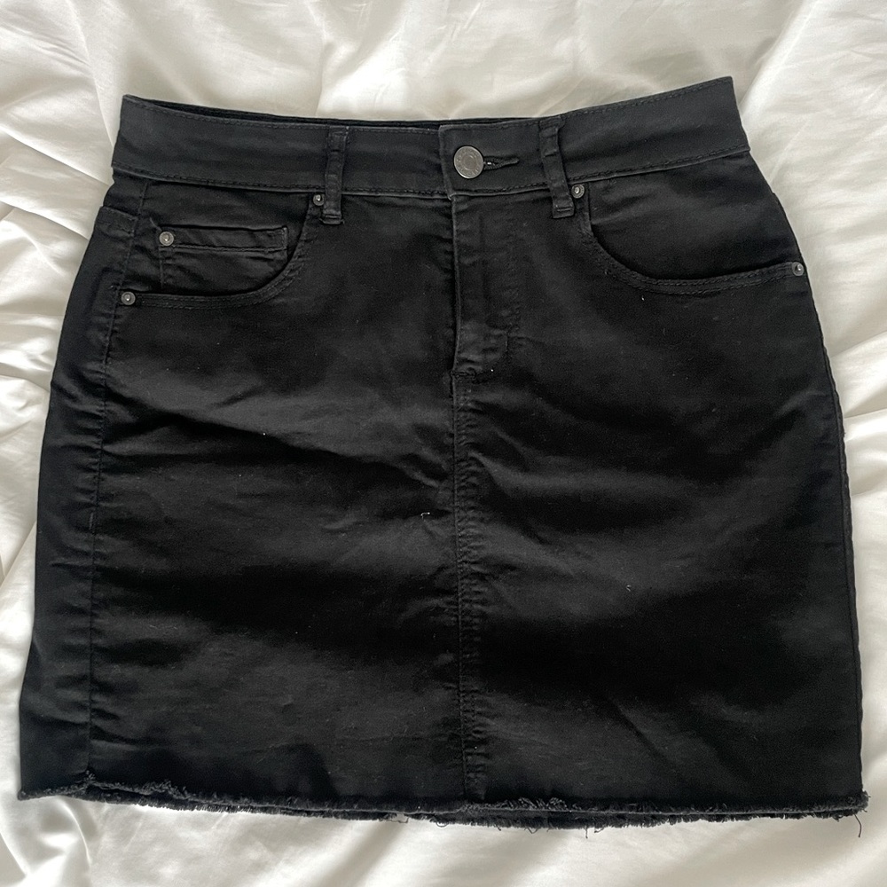 Black denim skirt by Garage